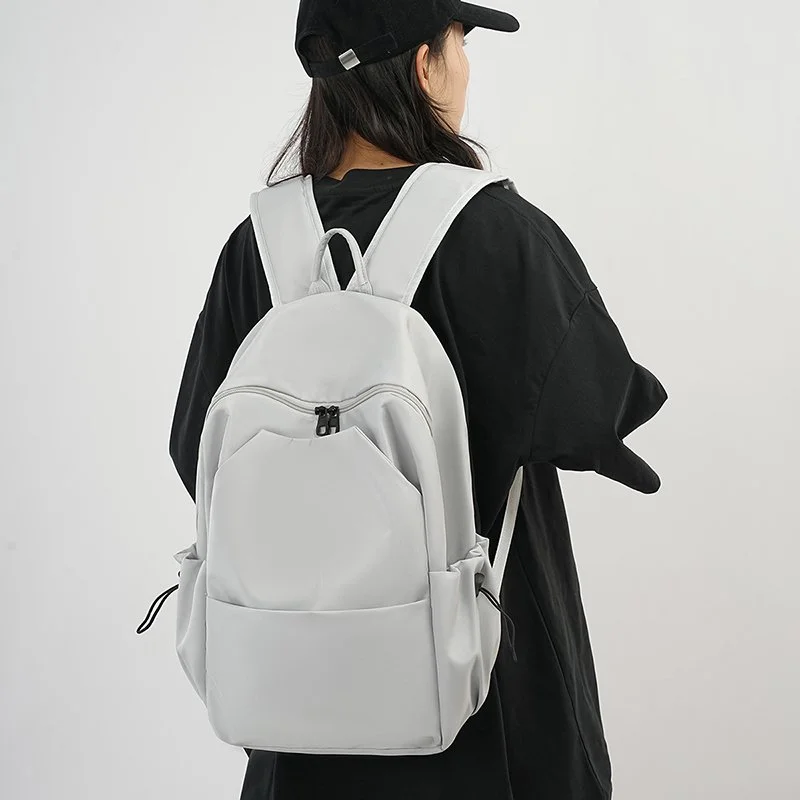 Large Capacity Waterproof Commuter Backpack for Students and Professionals
