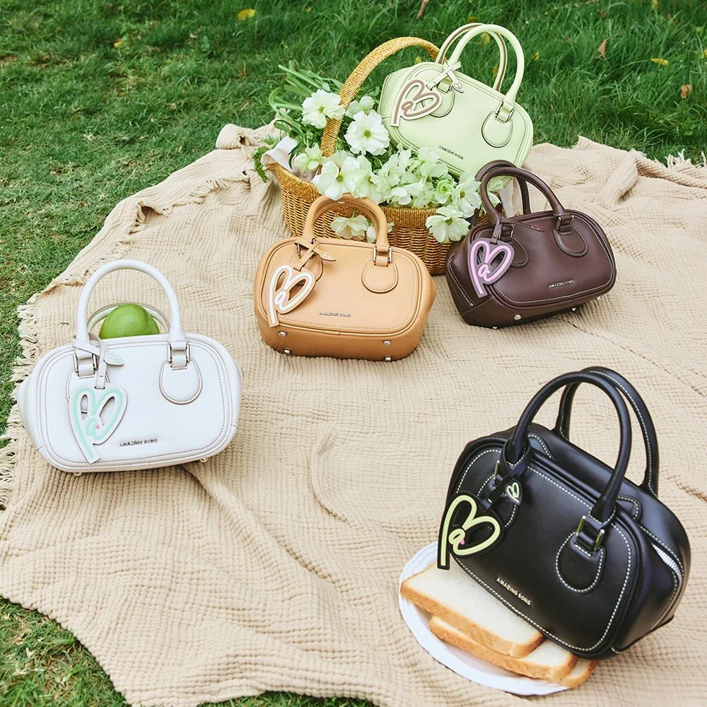 Microfiber Leather Bowling Handbag with Synthetic Leather Lining
