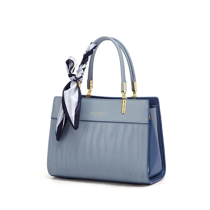 Elegant Blue Shoulder Bag with Scarf Accent