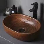 Elegant Brown Oval Ceramic Vessel Sink with Carved Line Texture