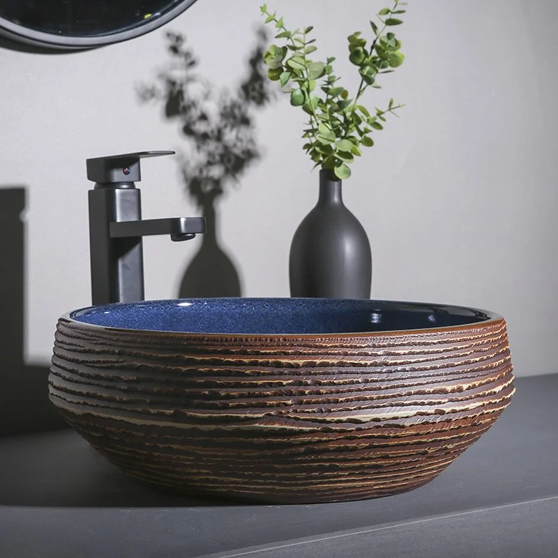 Elegant Round Navy Blue and Brown Ceramic Vessel Sink for Modern Bathrooms