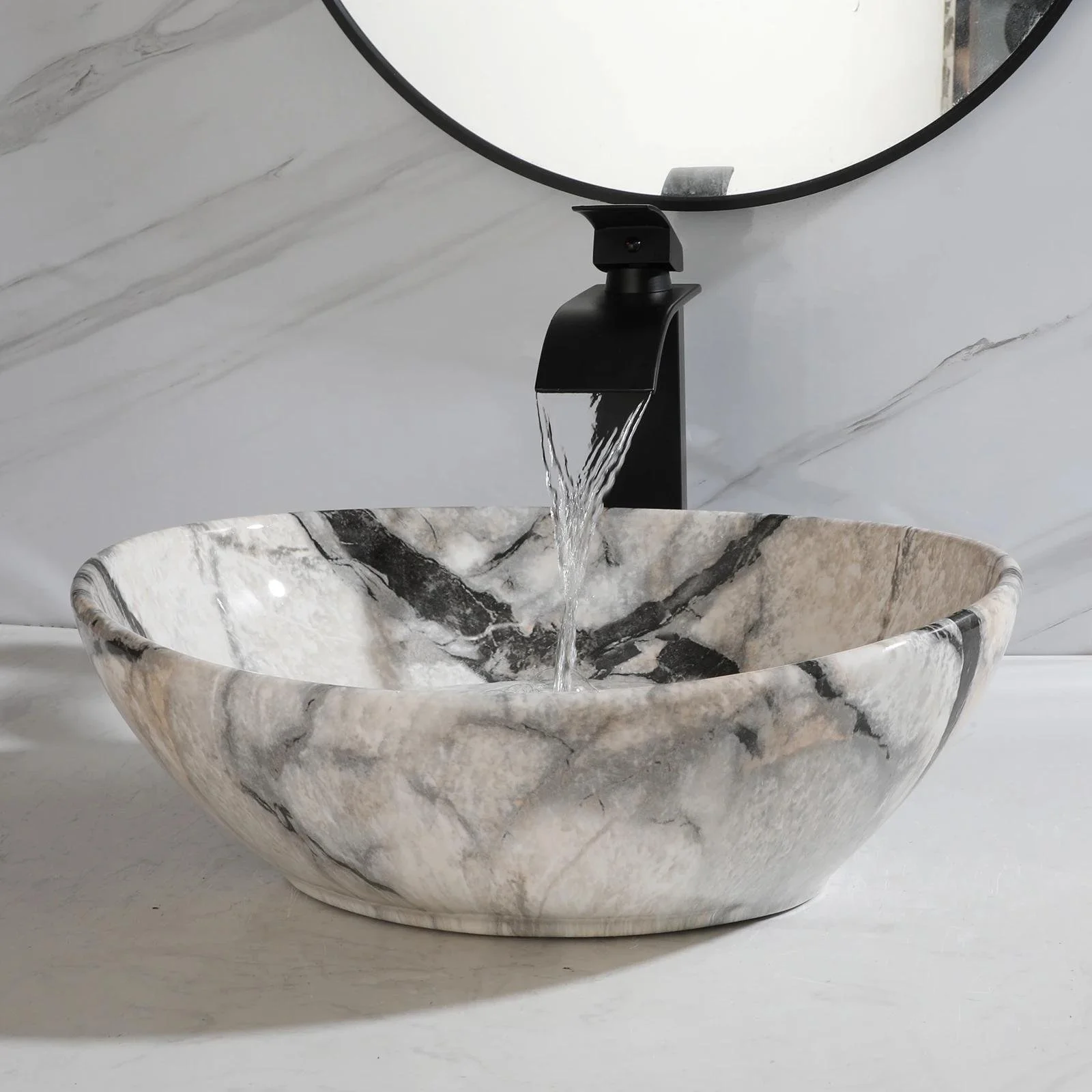 Elegant White Marble Oval Vessel Sink Set with Matte Black Faucet